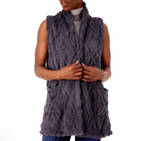 Koolaburra Jackets & Blazers - Koolaburra by UGG Embossed Sherpa Fleece Vest. Brand new without tags.